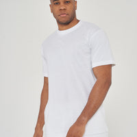 Upper body view of model wearing men's white oversized T-shirt, head to waist, 365 Collection.