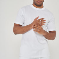 Front view worn by model - view with hands clasped each other.
