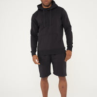 Male model front view wearing black 365 Regular Hoodie and matching shorts – regular fit, 365 Collection.