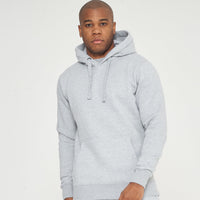Full-body front view of a male model wearing a grey regular fit hoodie and matching shorts - 365 Collection.