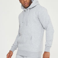 Side view of model in grey 365 Regular Hoodie - classic pullover hoodie for everyday wear.