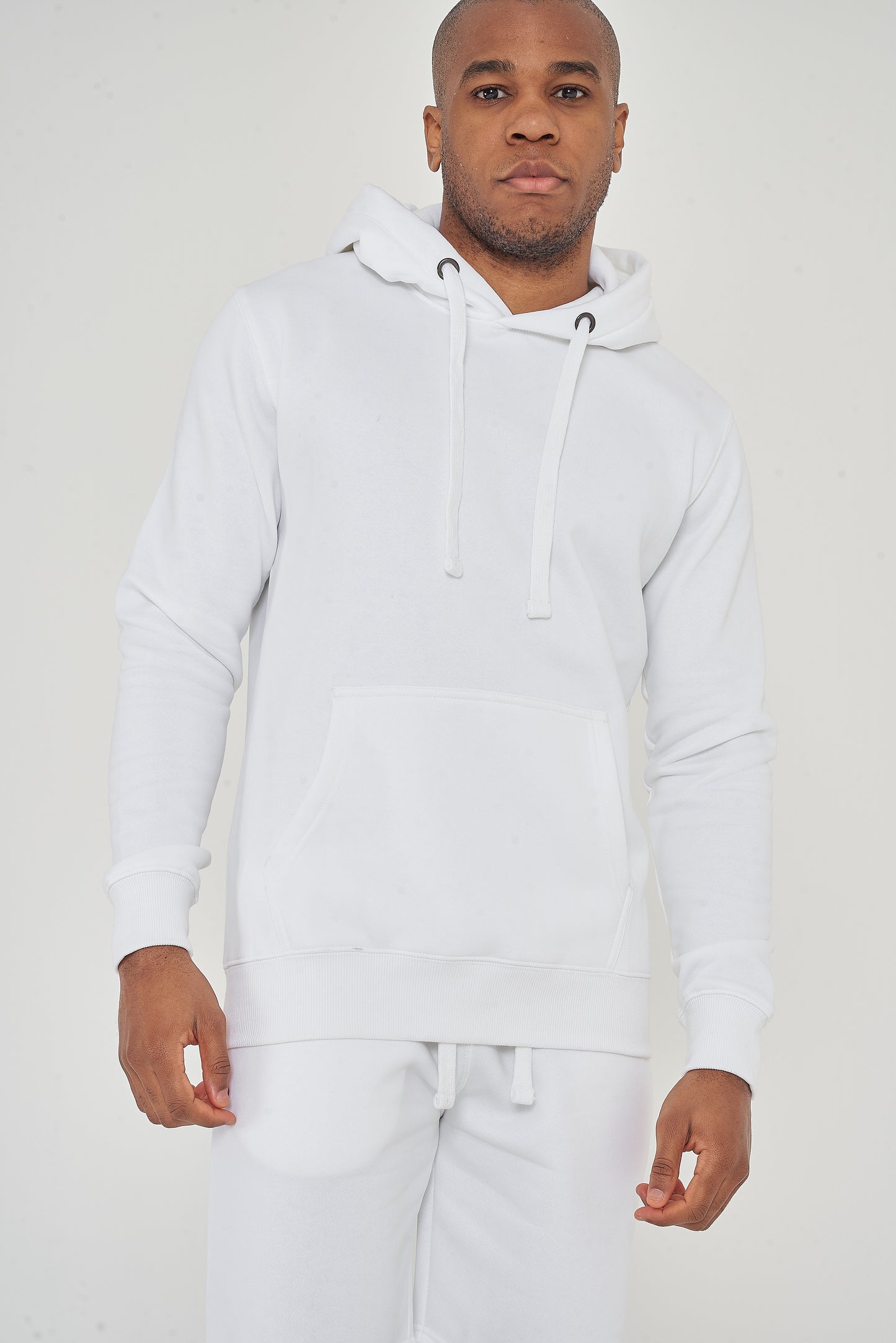 Upper-body front view of model wearing men’s white regular-fit hoodie – 365 Collection.