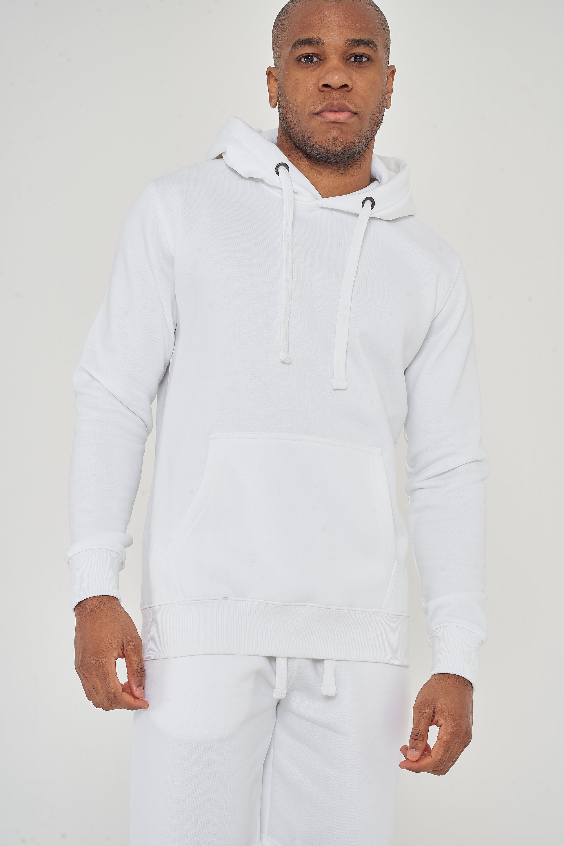 Upper-body front view of model wearing men’s white regular-fit hoodie – 365 Collection.