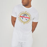 Man wearing the white Greece Season One T-Shirt styled with casual bottoms, highlighting the bold front graphic and comfortable oversized silhouette.