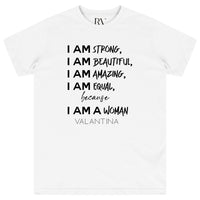 White oversized women’s T-shirt featuring bold black “I AM A WOMAN” text printed across the chest, classic round neckline, and short sleeves.