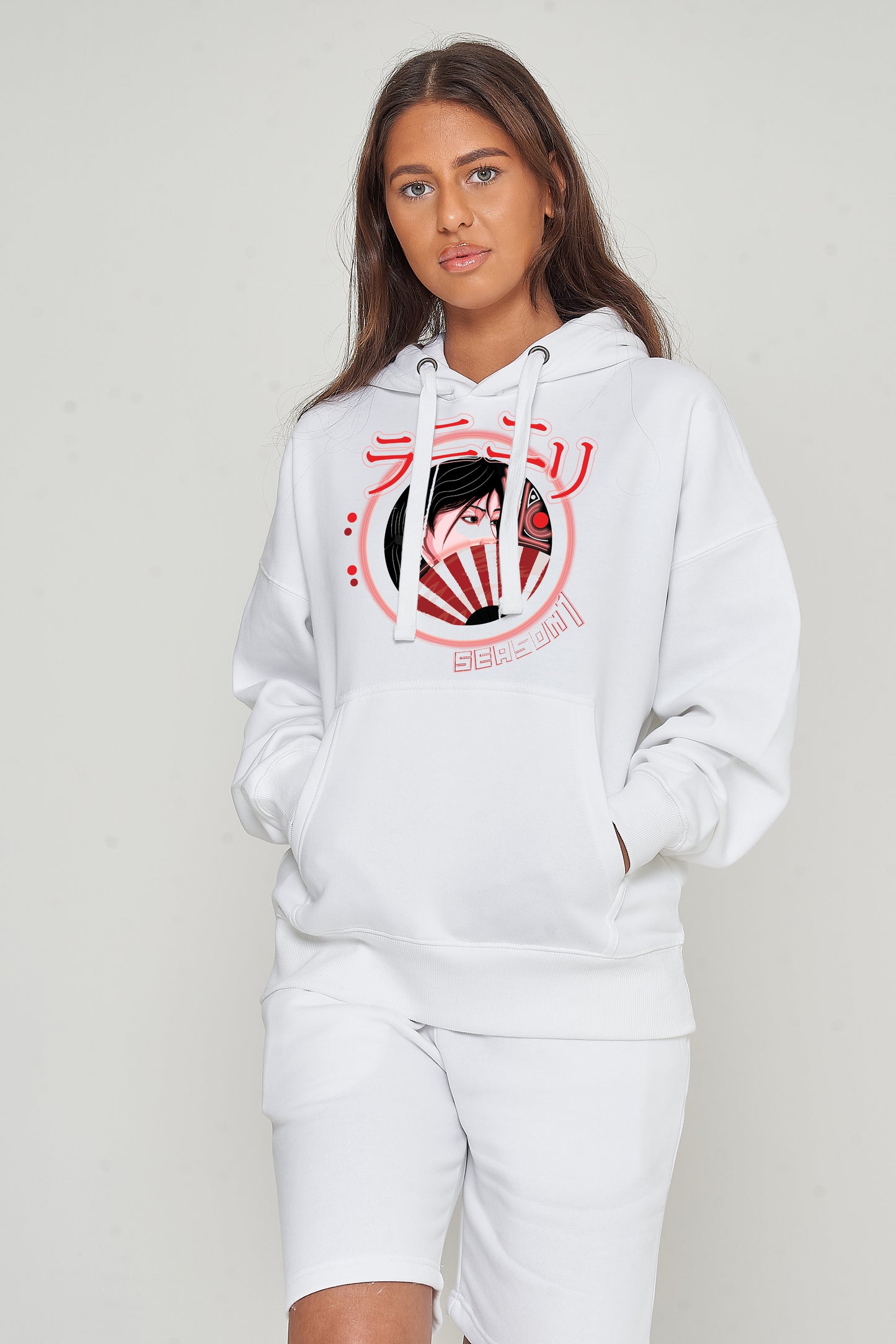 Woman wearing the white Japanese Lady Season 1 Hoodie styled with casual bottoms, highlighting the front graphic, relaxed fit, and hoodie details.