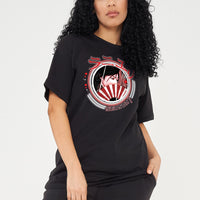 Woman wearing the Japanese Lady Season 1 Oversized T-Shirt styled with high-waisted jeans, highlighting the bold front graphic and relaxed oversized fit.