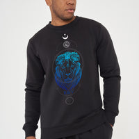 Man wearing black Leo sweatshirt, front view displaying bold print and effortless style.