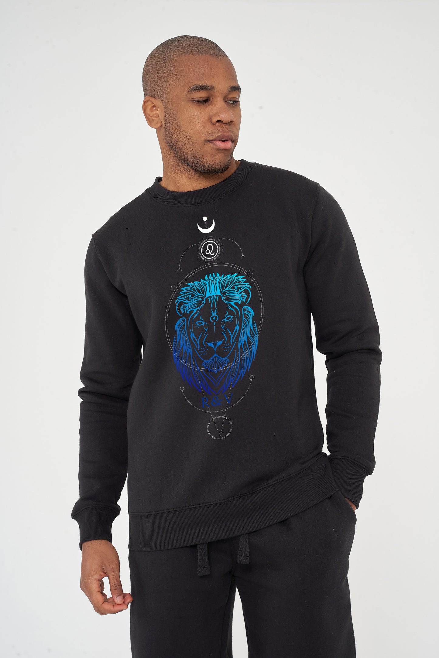 Man wearing black Leo sweatshirt, front view displaying bold print and effortless style.