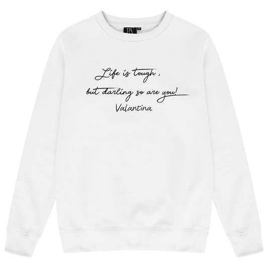 White women’s sweatshirt featuring bold black “Life is tough but darling so are you” motivational quote printed across the chest, round neckline, long sleeves, and ribbed cuffs and hem.