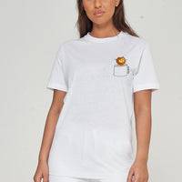 Woman wearing the white Lion Pocket T-Shirt styled with casual bottoms, highlighting the distinctive lion pocket print and comfortable oversized fit. 