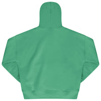 Laid-flat green hoodie showing the plain back, ribbed cuffs and hem, and relaxed oversized fit silhouette.