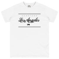 White oversized women’s t-shirt featuring a bold “Los Angeles” graphic print centered on the front, with a classic round neckline and short sleeves.