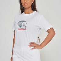 Woman wearing the Lucky Cards Oversized T-Shirt styled with casual bottoms, highlighting the striking front graphic and comfortable oversized silhouette.