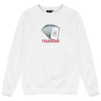 White oversized women’s sweatshirt featuring a bold multi-card inspired graphic print on the chest, classic crew neckline, and long ribbed sleeves.