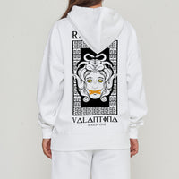 Woman wearing the Medusa Oversized Hoodie (white), styled with casual bottoms, highlighting the dramatic back graphic and comfortable, relaxed fit.