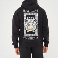 Male model rear view wearing black Medusa Season One Oversized Hoodie with Medusa graphic – oversized fit.