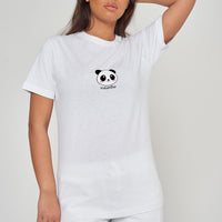 Woman wearing the white Panda Head Graphic T-Shirt styled with casual bottoms, emphasizing the bold front panda head print and comfortable oversized fit. 