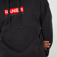 Person wearing the black Red Box Oversized Hoodie styled with casual bottoms, highlighting the front red box graphic and comfortable, roomy silhouette.