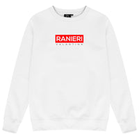 White oversized sweatshirt featuring a bold red box graphic printed centrally on the chest, adjustable drawstring hood, and ribbed cuffs and hem.