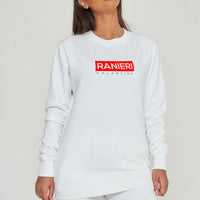 Woman wearing the white Red Box Oversized Sweatshirt styled with casual bottoms, highlighting the bold front red box print and comfortable oversized silhouette.