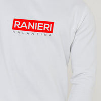 Person wearing the white Red Box Sweatshirt styled with casual bottoms, highlighting the front red box graphic and comfortable fit.