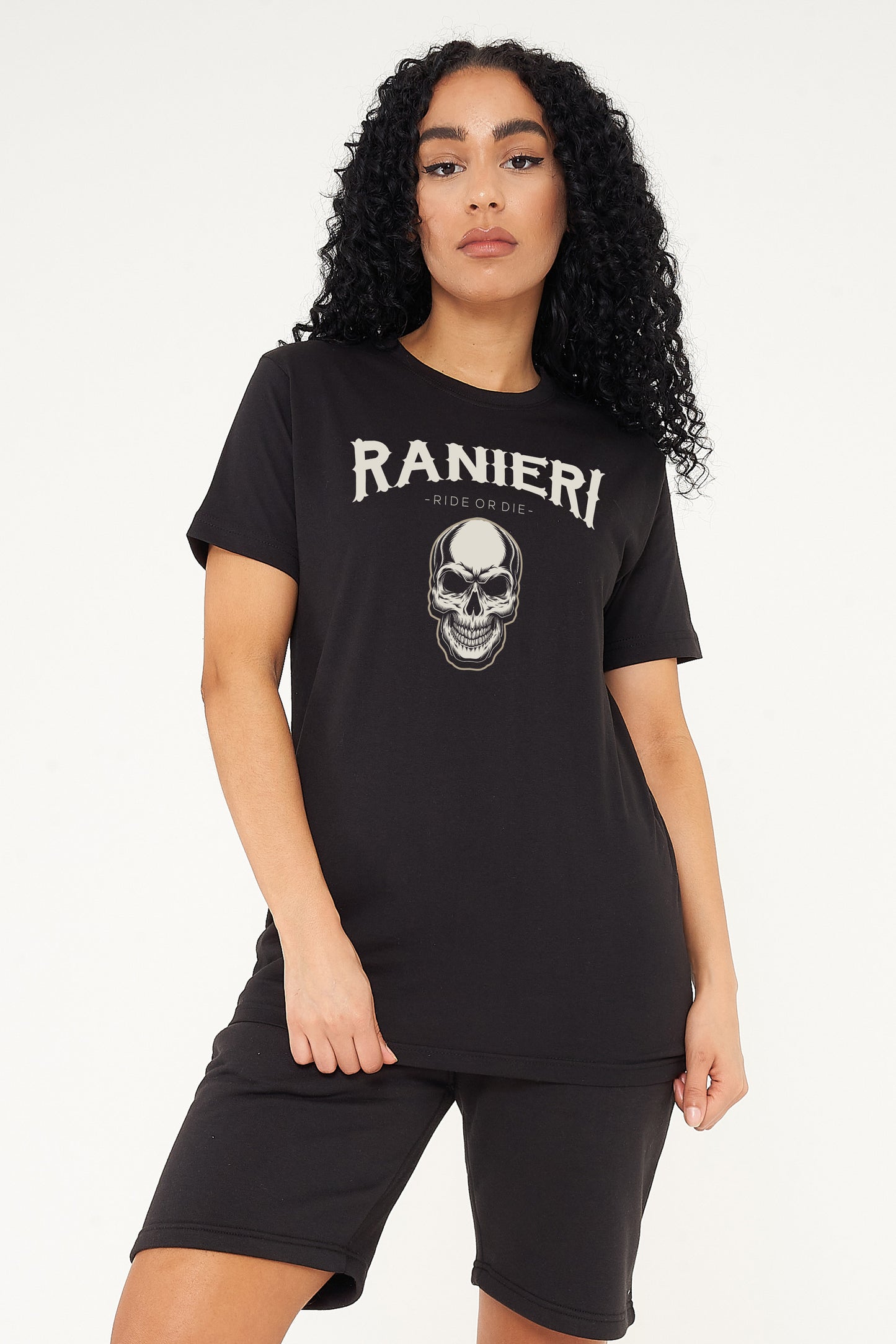 Model image: Woman wearing the black Ride or Die Oversized T-Shirt styled with casual bottoms, highlighting the front “Ride or Die” print and comfortable fit.