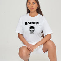 Woman wearing the white Ride or Die Oversized T-Shirt styled with casual bottoms, highlighting the bold front print and comfortable silhouette.