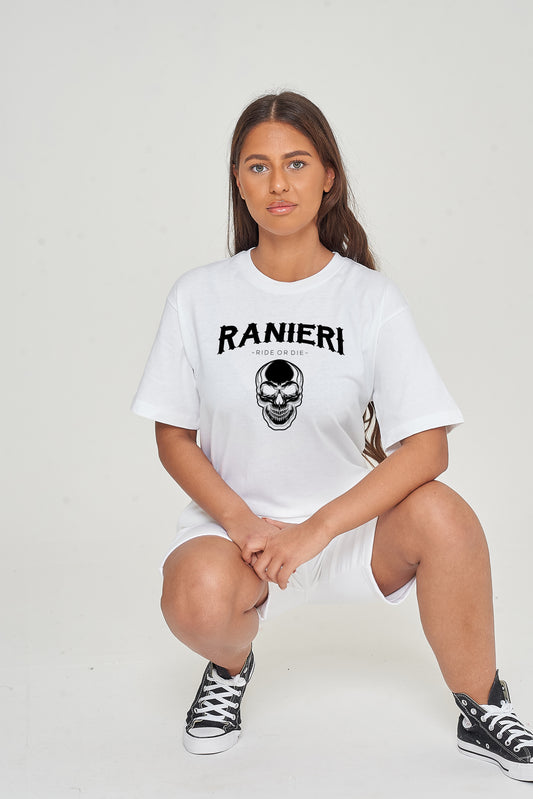 Woman wearing the white Ride or Die Oversized T-Shirt styled with casual bottoms, highlighting the bold front print and comfortable silhouette.