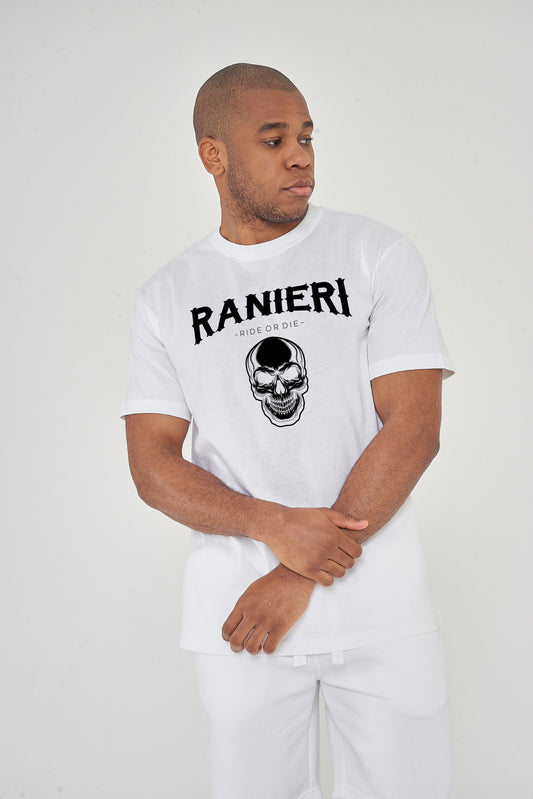 Male model wearing white Ride or Die T-shirt with Ranieri skull graphic, styled with white bottoms - regular fit.