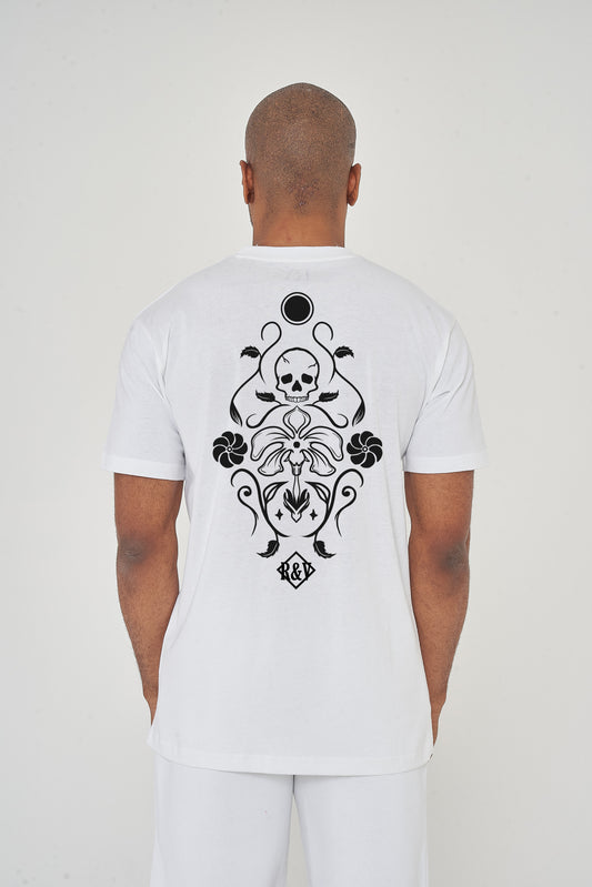 Man wearing the white Skull Tattoo Oversized T-Shirt styled with casual bottoms, showcasing the striking back graphic and comfortable oversized fit.