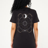 Laid-flat black women’s T-shirt showing a clean front view, round neckline, short sleeves, and relaxed oversized silhouette.