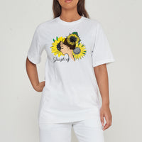 Woman wearing the white Sunflower Girl Oversized T-Shirt styled with casual bottoms, highlighting the front sunflower graphic and comfortable fit.