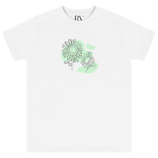 White oversized T-shirt featuring a bold green sunflower floral print centered on the chest with a classic crew neckline.