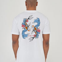 Man wearing the white Twin Koi Oversized T-Shirt styled with casual bottoms, showcasing the striking koi back print and comfortable silhouette.