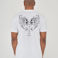 Man wearing the white Twin Lion Oversized T-Shirt styled with casual bottoms, displaying the striking back graphic and comfortable oversized silhouette.