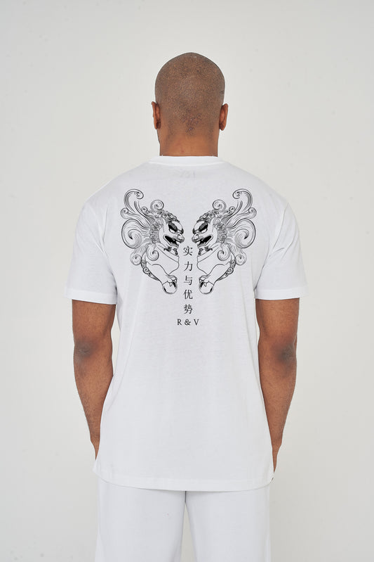 Man wearing the white Twin Lion Oversized T-Shirt styled with casual bottoms, displaying the striking back graphic and comfortable oversized silhouette.