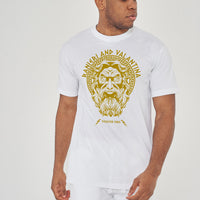 Man wearing white Zues Yellow Print Graphic T-Shirt styled with dark denim, showcasing the front graphic and relaxed oversized fit.